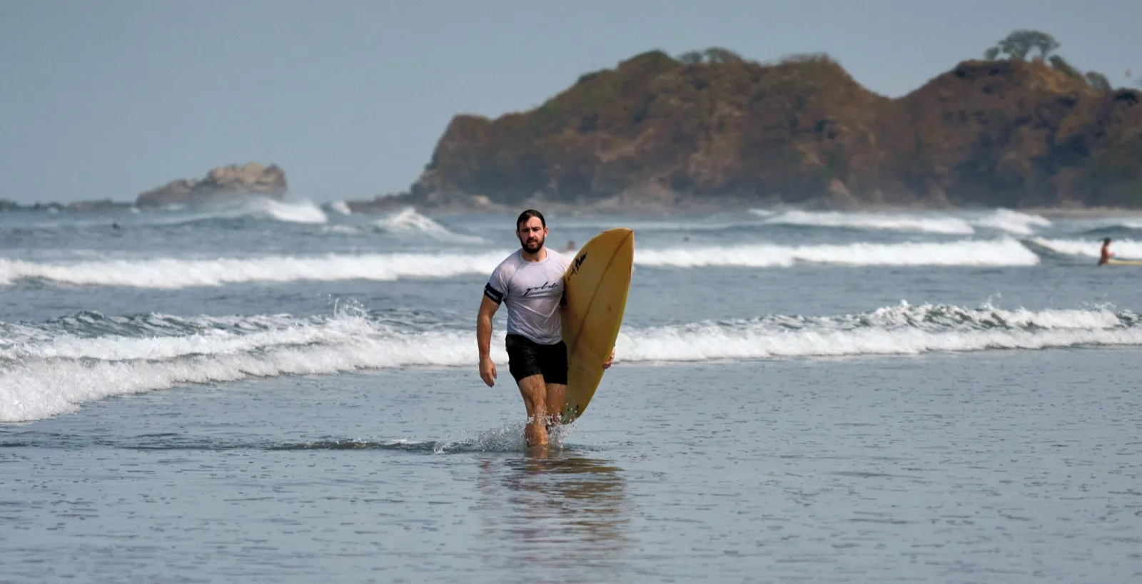 Tyler outdoors at the beach
