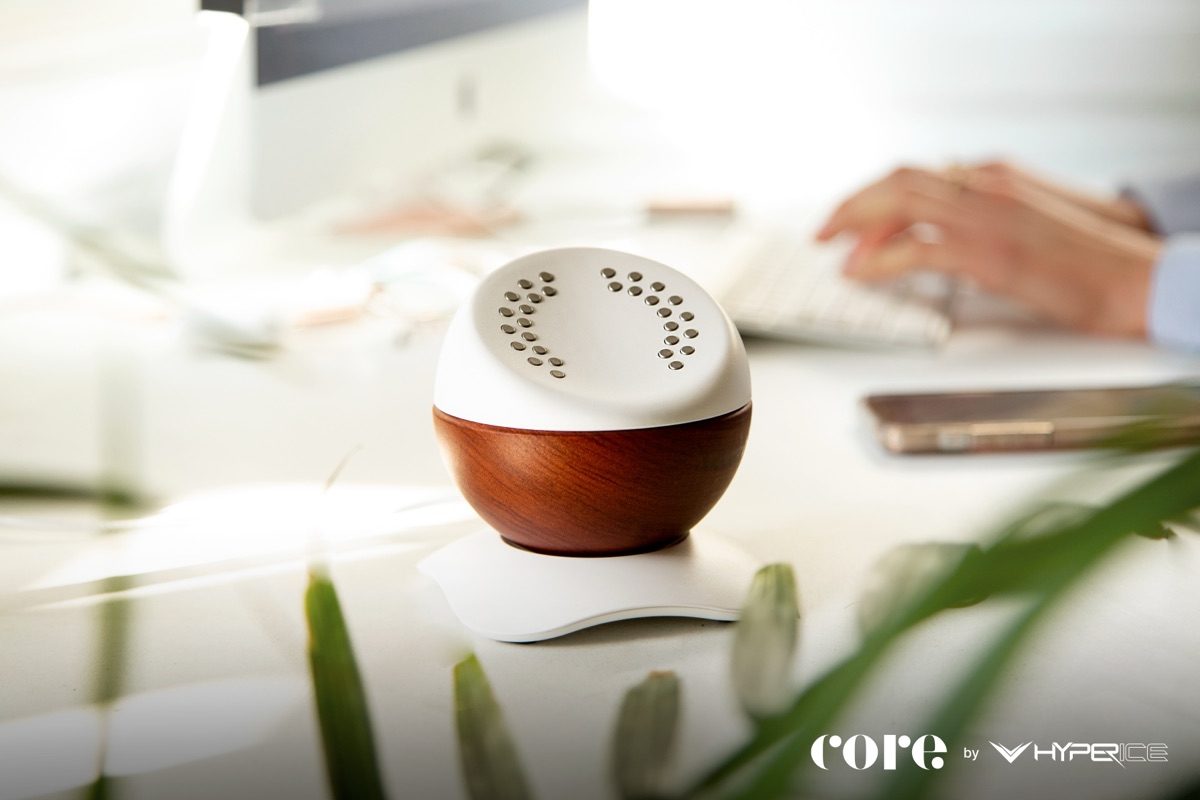 Core by Hyperice meditation device on desk with Core branding watermark